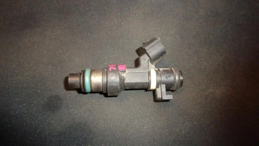 Форсунка инжекторная электрическая Nissan Almera Classic B10