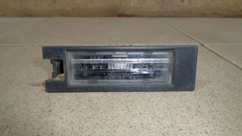 Фонарь подсветки номера Chevrolet Cobalt T250