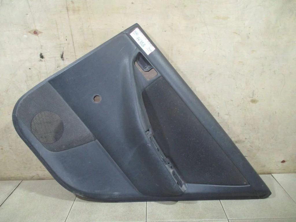 Обшивка двери задней правой Toyota Corolla (E120)