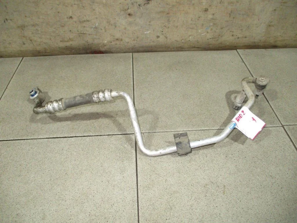 Трубка кондиционера Kia RIO 2 2006 (JB)