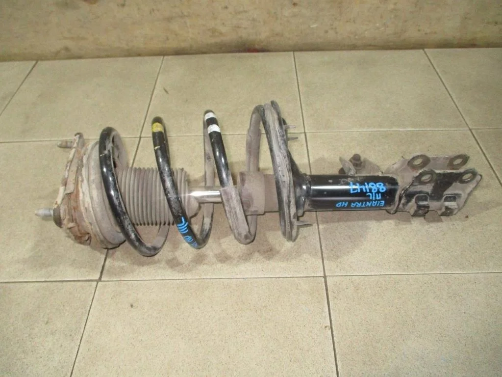 Амортизатор передний левый Hyundai Elantra HD