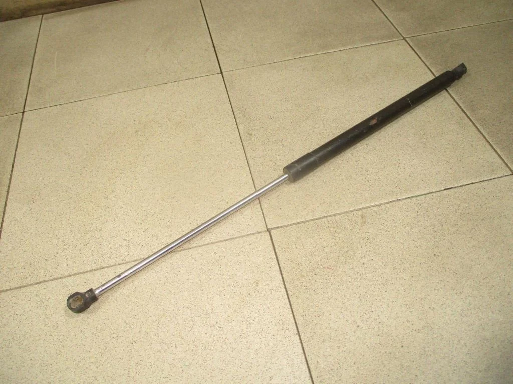 Амортизатор капота Renault Logan 2 L52