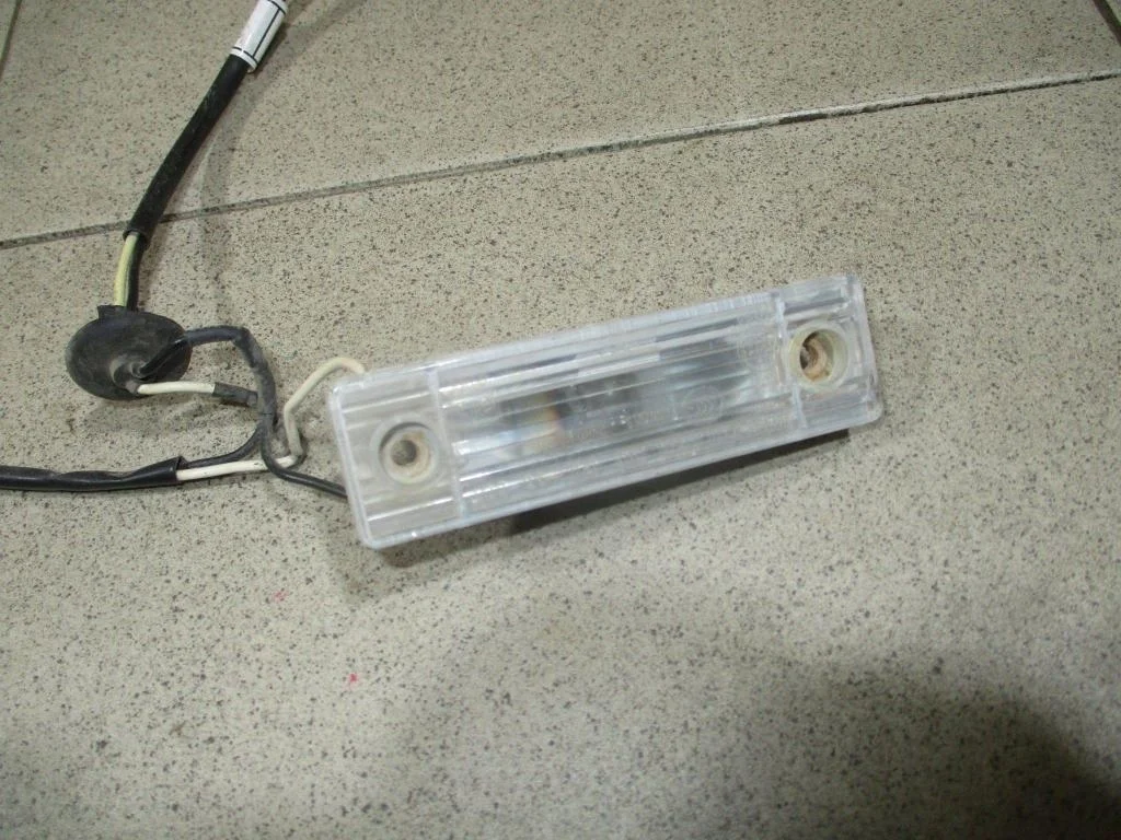 Фонарь подсветки номера Chevrolet Lacetti J200