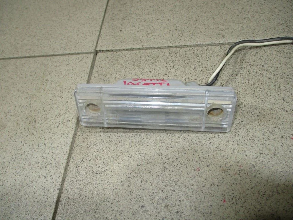 Фонарь подсветки номера Chevrolet Lacetti J200