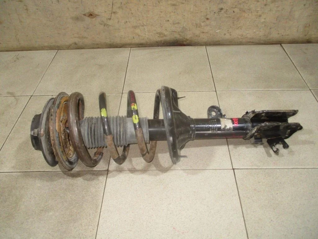 Амортизатор передний левый Kia Sportage 2 2007 KM