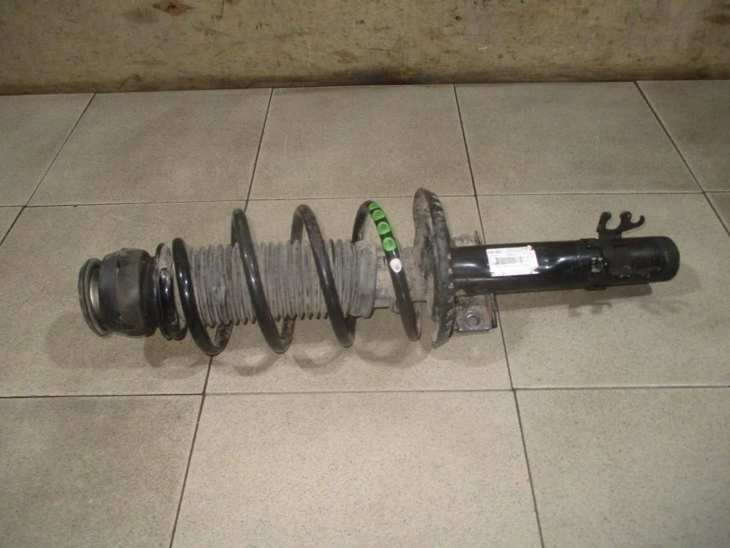 Амортизатор передний Volkswagen Polo 5