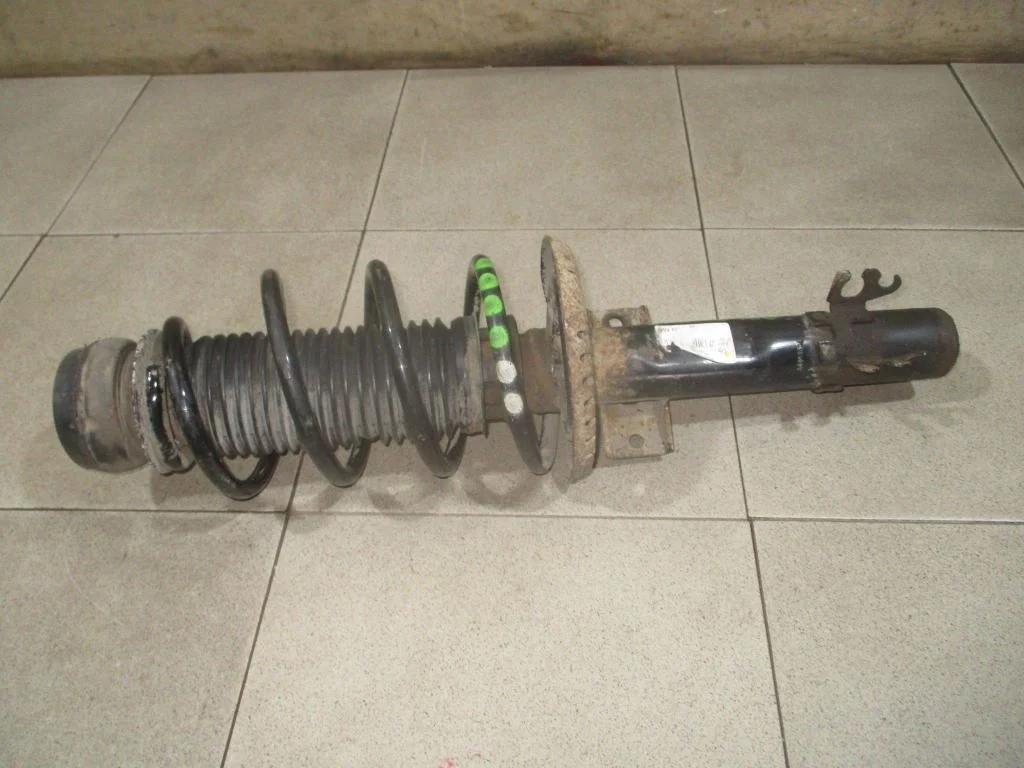 Амортизатор передний Volkswagen Polo 5