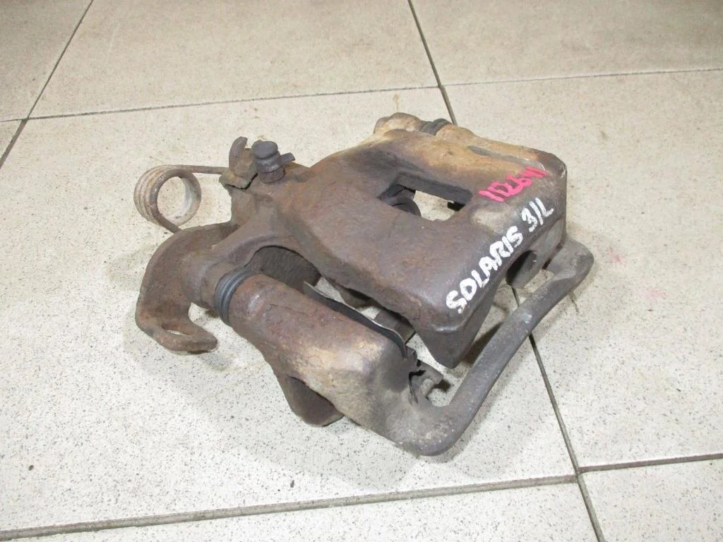 Суппорт задний левый Hyundai Solaris 1 RB