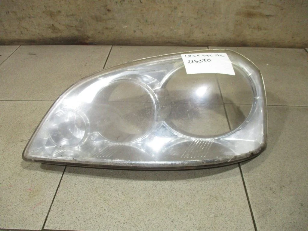 Стекло фары левой Chevrolet Lacetti J200
