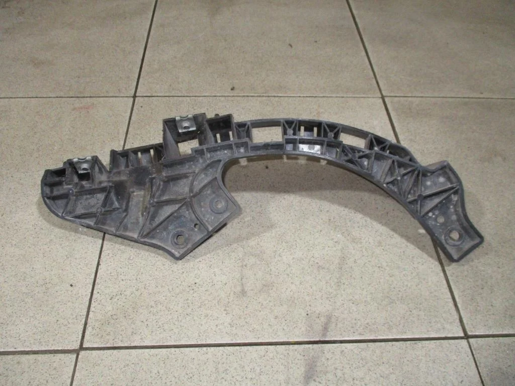 Кронштейн фар левый Subaru Forester (S12/SH)