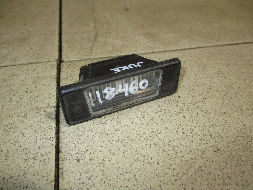 Фонарь подсветки номера Nissan Juke 2011 F15