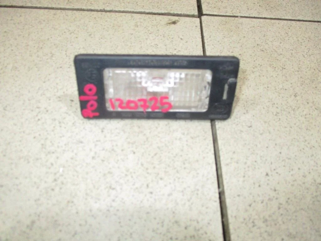 Фонарь подсветки номера Volkswagen Polo 5