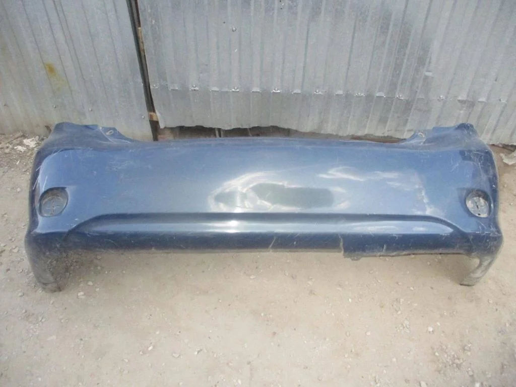 Бампер задний Toyota Corolla (E150)