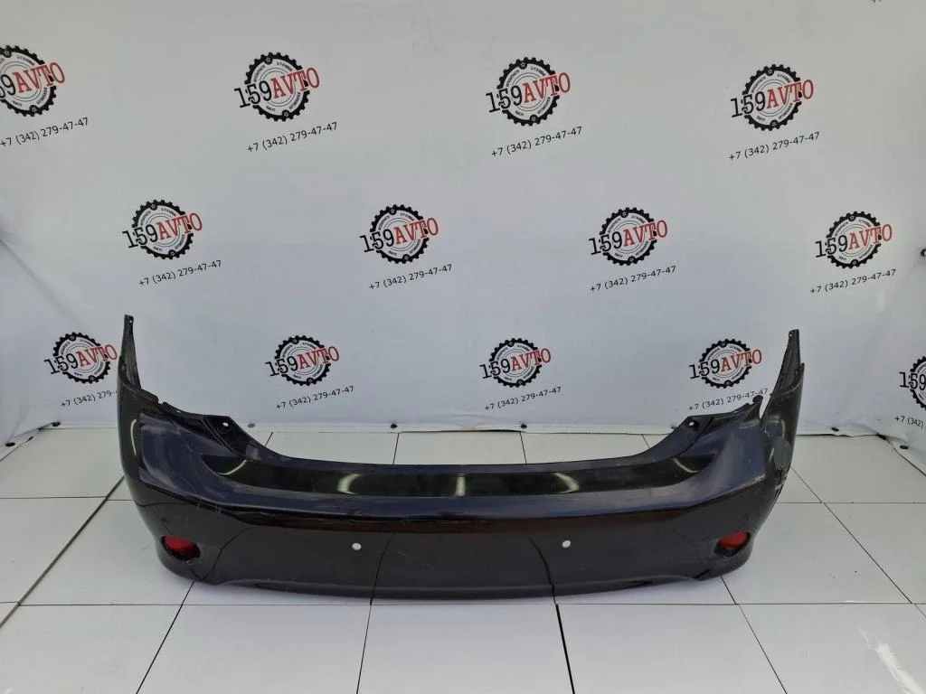 Бампер задний Toyota Corolla (E150)