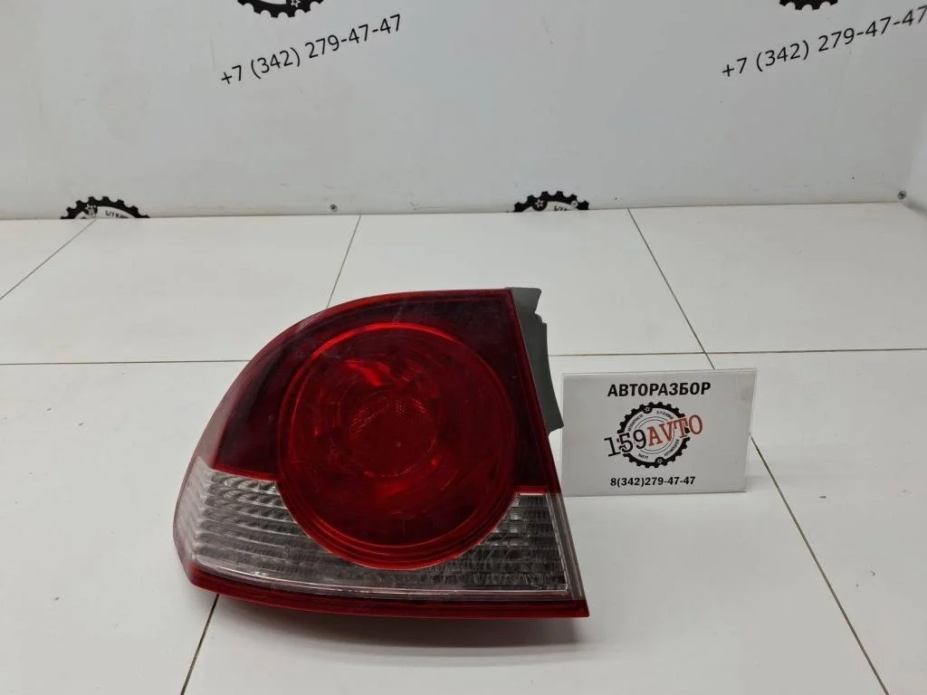 Фонарь задний наружный левый Honda Civic 4D VIII