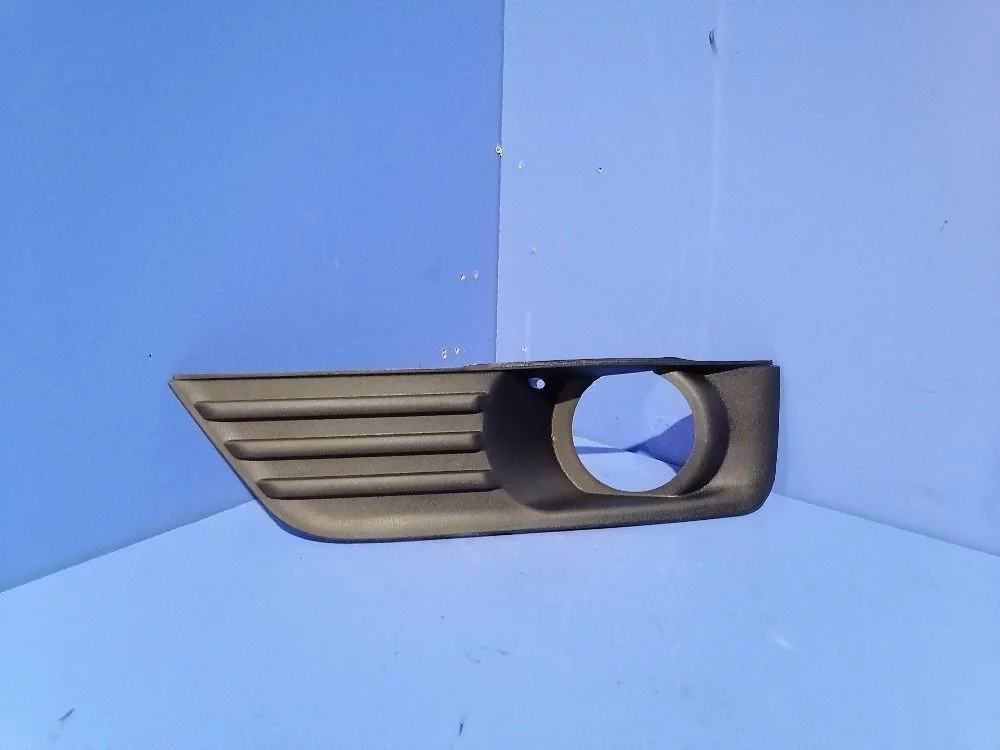 Решетка бампера левая (под ПТФ) Ford Focus II (2005—2008) 1337349