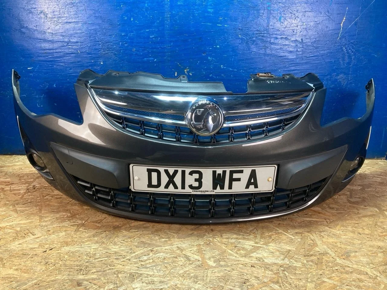 Бампер Opel Corsa D 2010-2015 13285996, передний