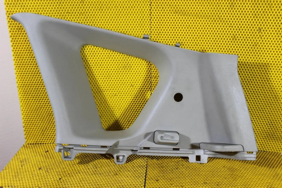 Обшивка багажника Nissan Note 769349U000, правая