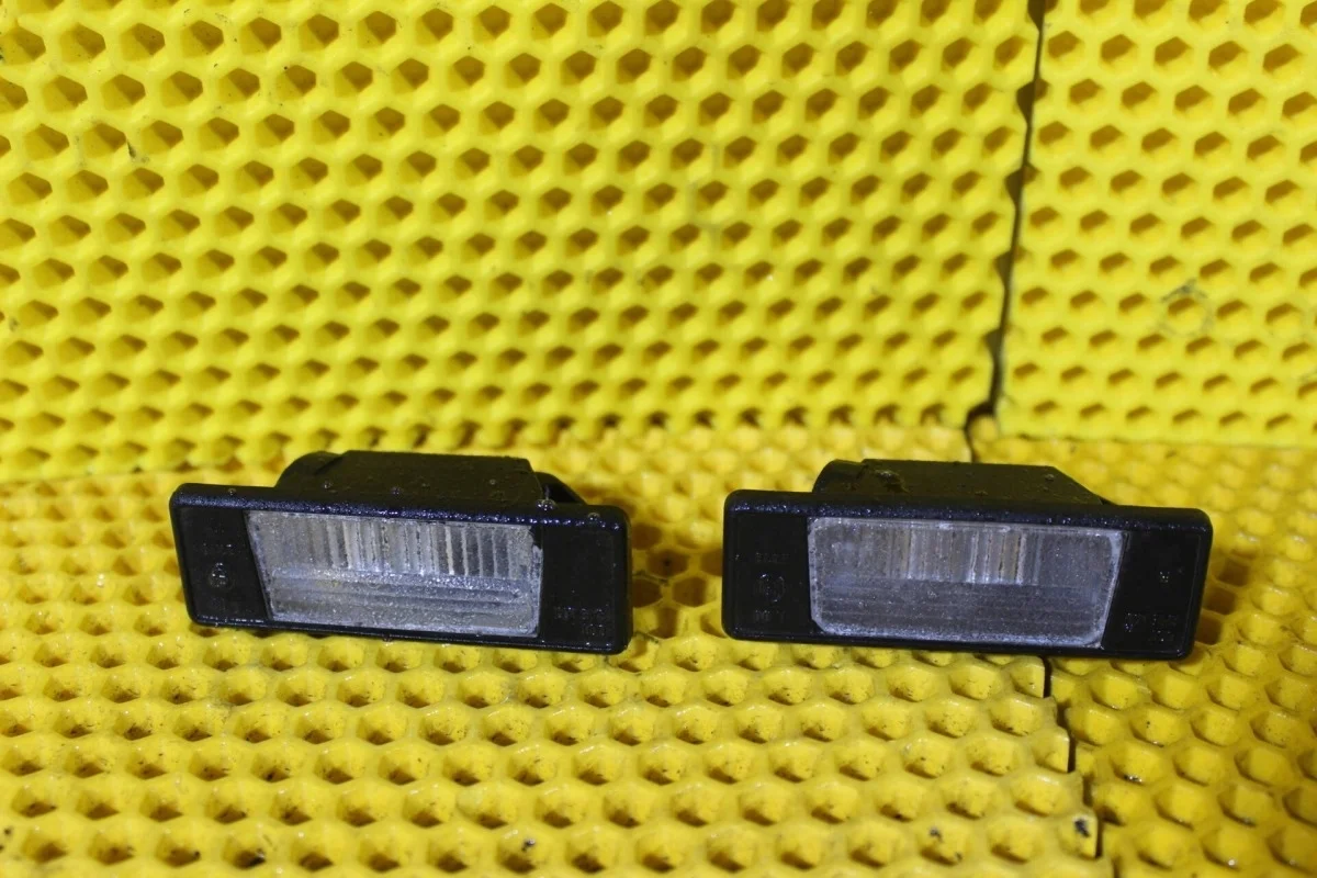 Подсветка номера Nissan Qashqai 26510JD00A J10