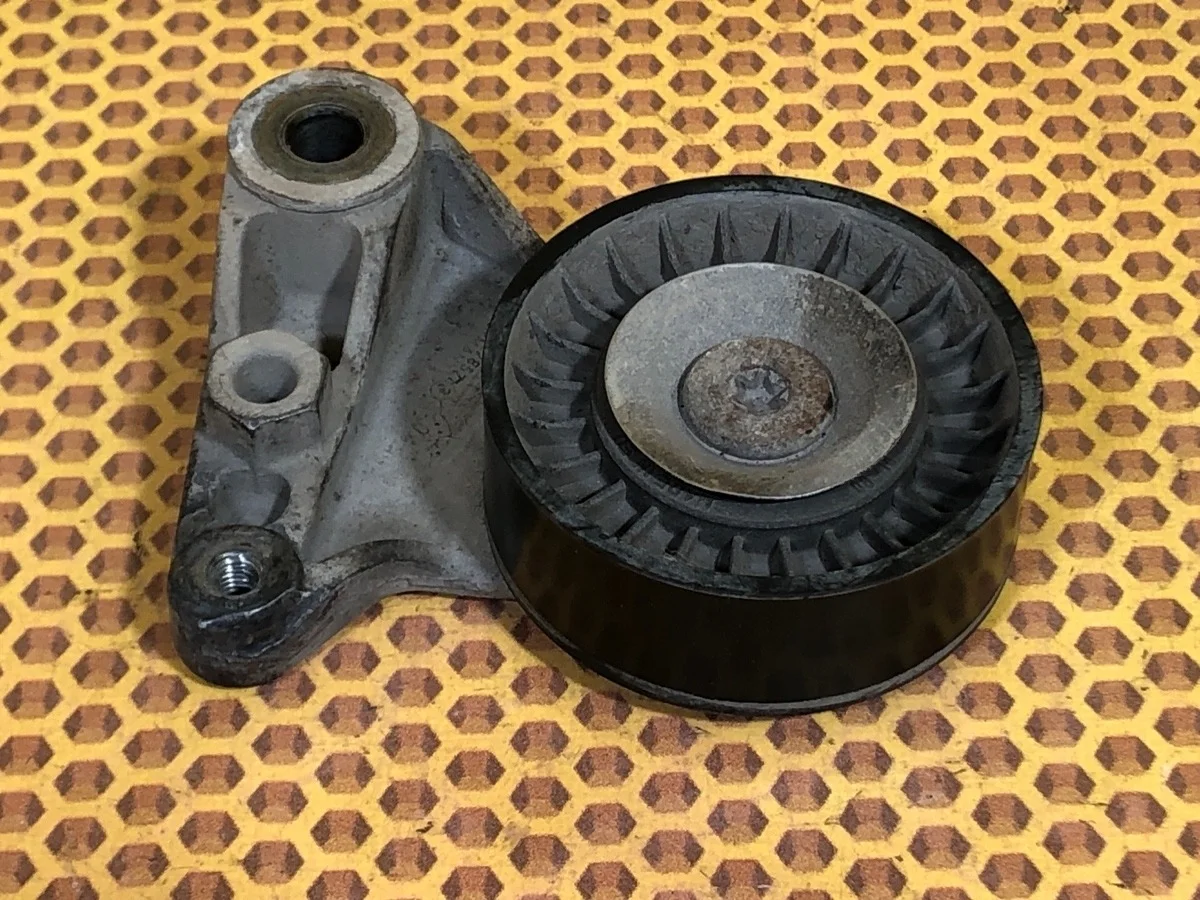 Натяжитель ремня приводного Nissan Patrol 2004 117502W203 Y61 ZD30DDTI