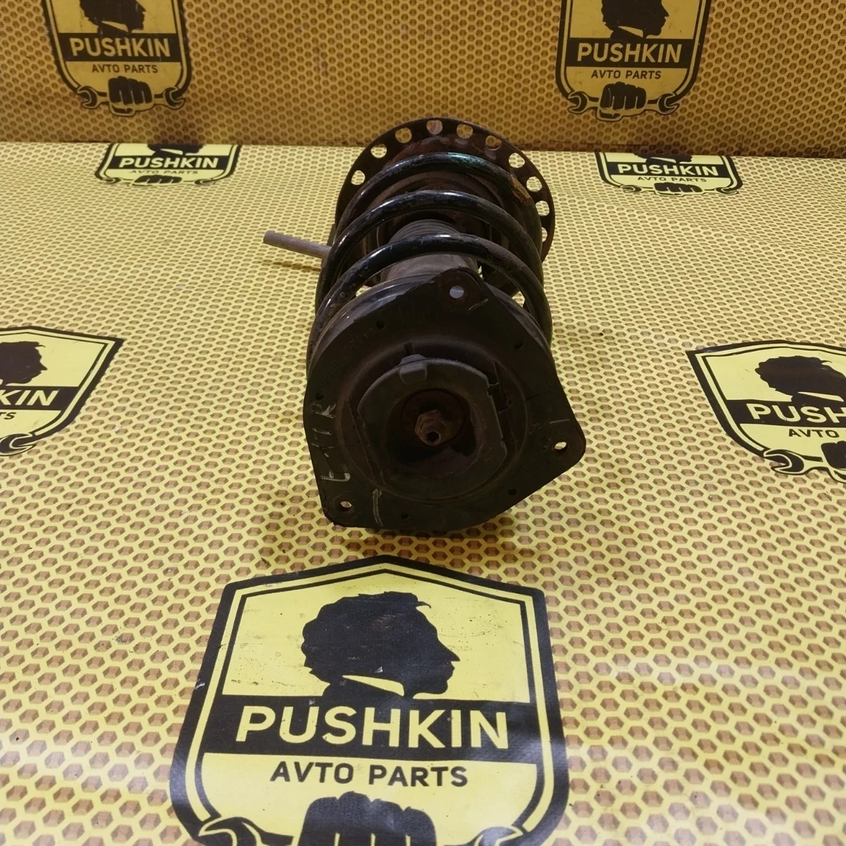 Амортизатор подвески Nissan Note 2008 543029U025 E11, передний правый