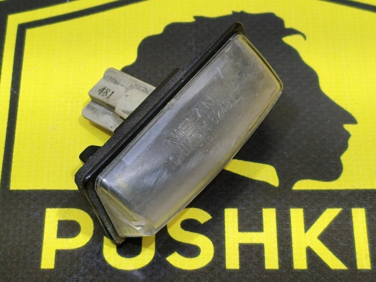 Подсветка номера Nissan Almera 2015 265109Y00A G15 K4M, правая