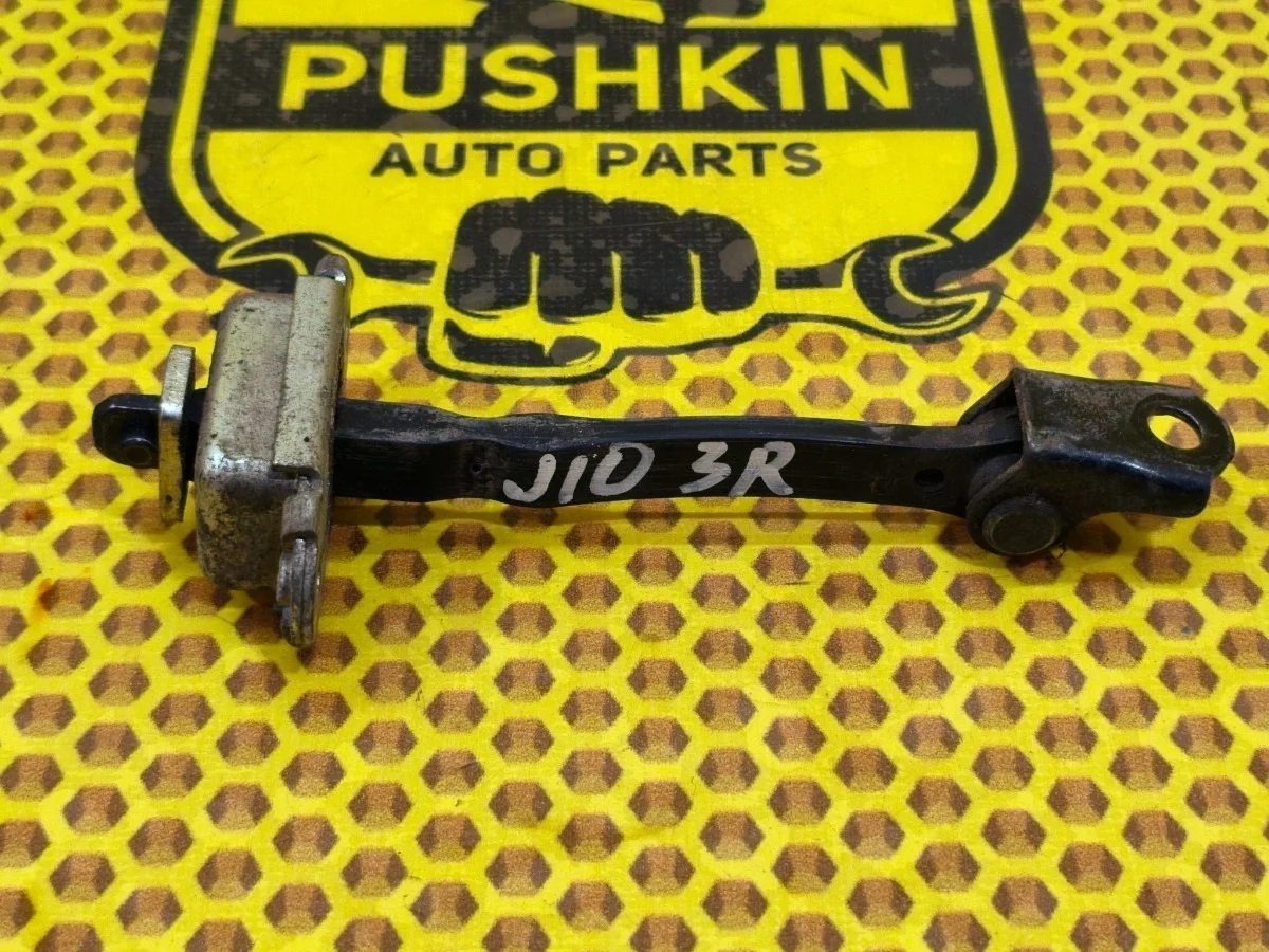 Ограничитель двери Nissan Qashqai 2012 82430JD000 J10 HR16DE, задний правый