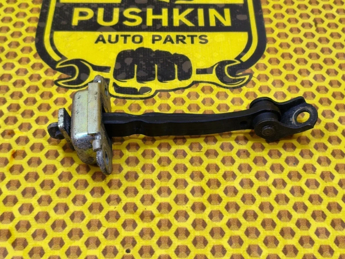 Ограничитель двери Nissan Qashqai 2012 80430JD000 J10 HR16DE, передний левый
