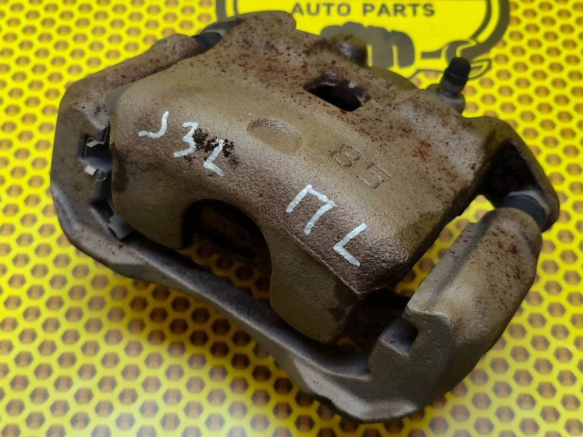 Суппорт Nissan Teana 2013 41011JN00A J32 VQ25DE, передний левый