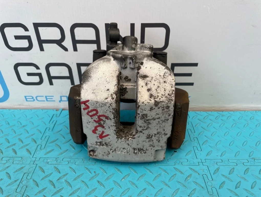 Суппорт Bmw X5 2009 34216776787 E70 N52B30AF 3.0, задний левый