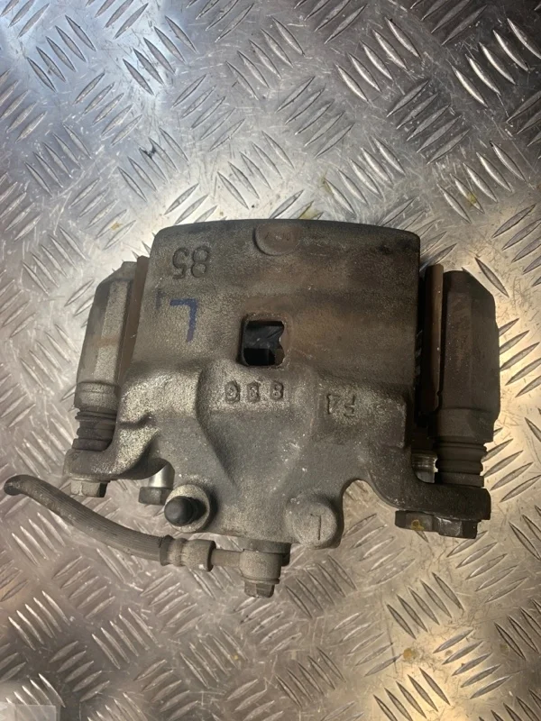 Суппорт тормозной Nissan Teana 41011JN00A J32 VQ25DE, передний левый