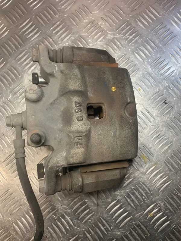 Суппорт тормозной Nissan Teana 41001JN00A J32 VQ25DE, передний правый