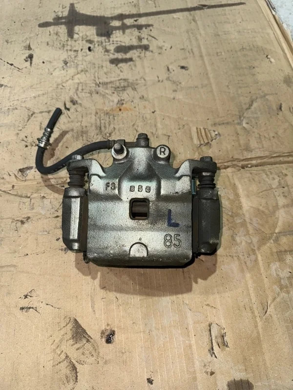 Суппорт тормозной Nissan Teana 41001JN00A J32 VQ25DE 2.5, передний правый