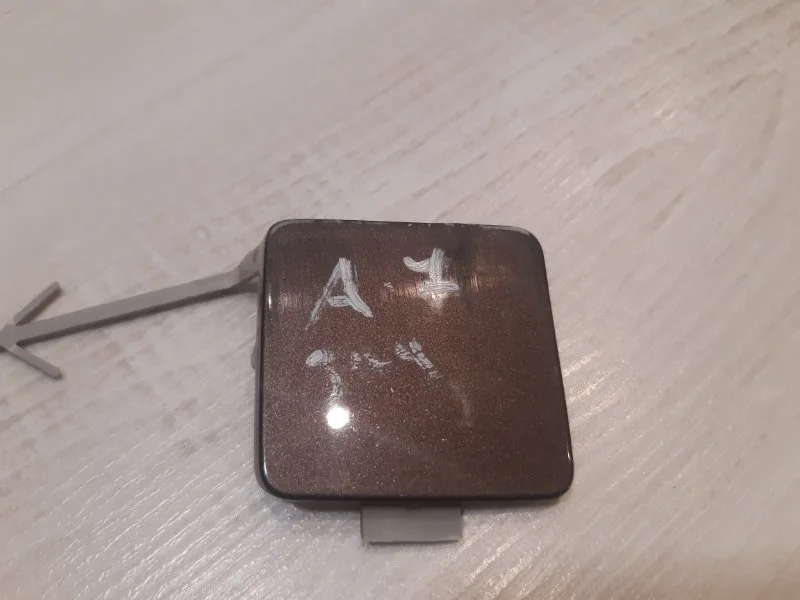 Заглушка буксировочного крюка Skoda Octavia A7(дорест)