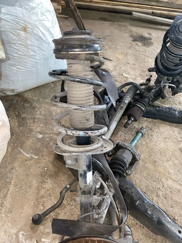 Амортизатор подвески Nissan Qashqai 54302JD01A J10 MR20DE, передний правый