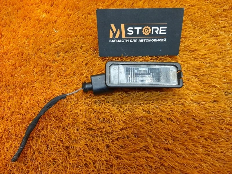 Подсветка номера Volkswagen Passat 2011 1K8943021 B7 CAXA