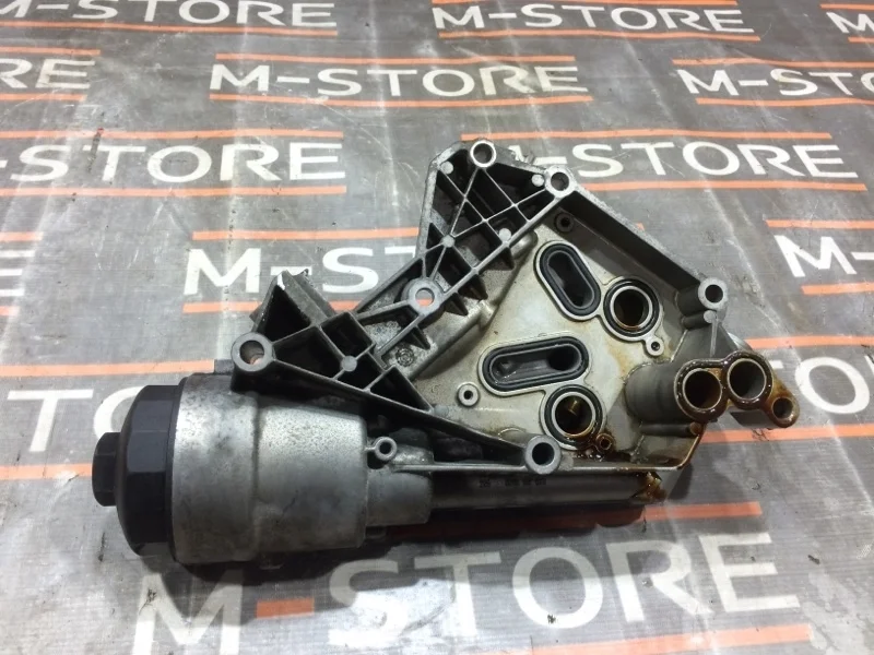 Корпус масляного фильтра Volkswagen Touareg 2004 077115401L 7L AXQ