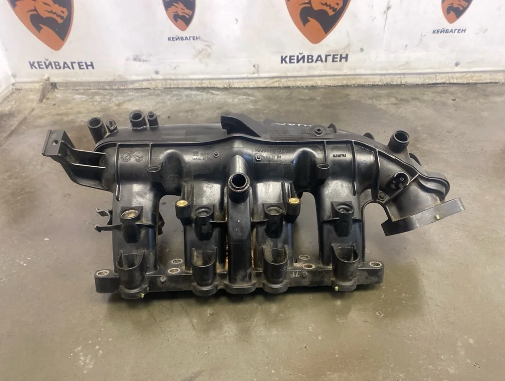 Коллектор впускной Opel Astra 2012 J