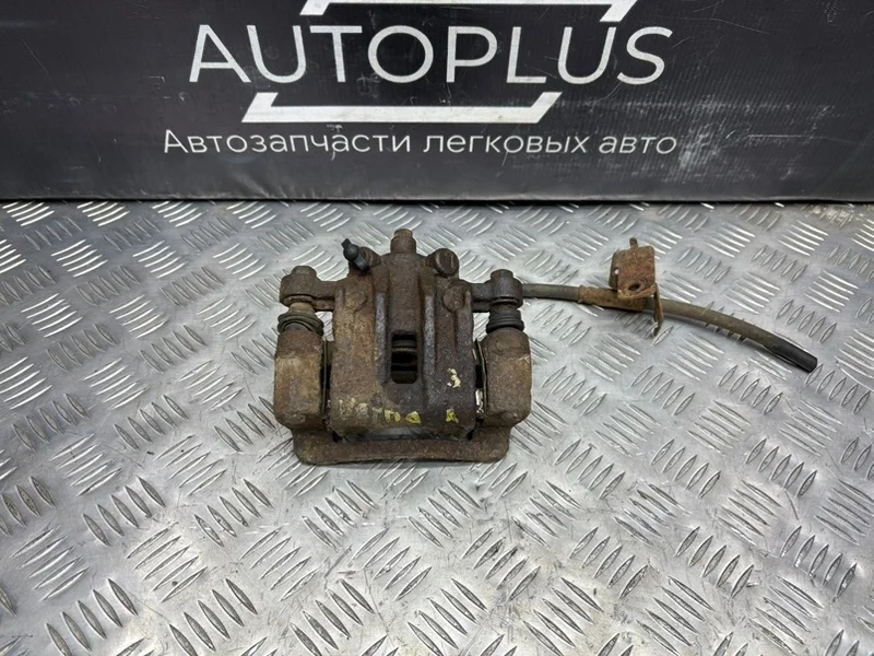Суппорт Hyundai Verna 2006-2010 583001G300 1.4, задний