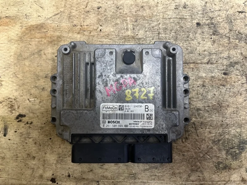 Блок управления двигателем Ford Focus BV6112A650BD CB8 MGDA