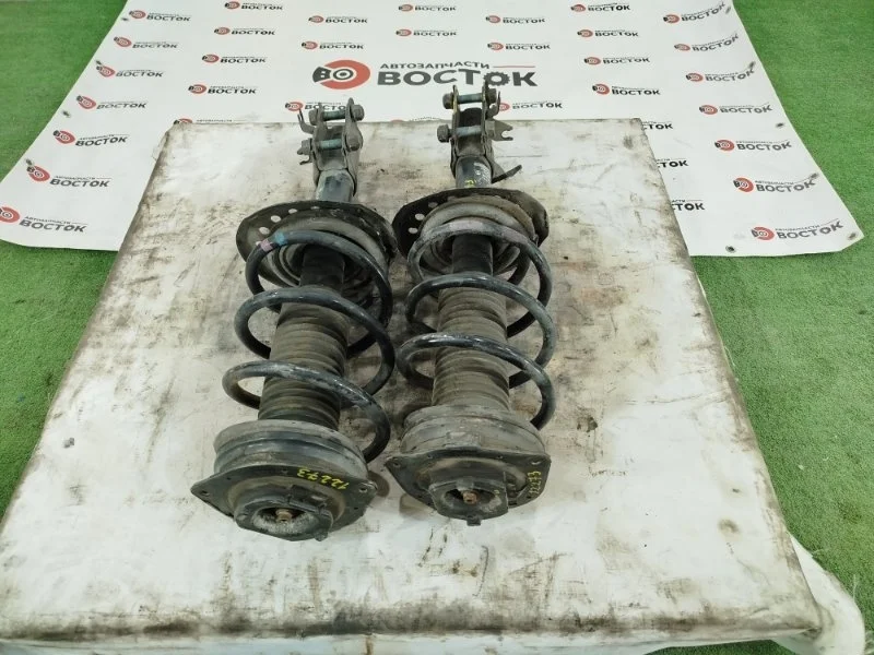 Стойка подвески Nissan Qashqai 2006-2013 54303JD01A J10 MR20, передняя