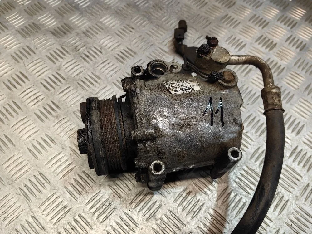 Компрессор кондиционера Mitsubishi Lancer 9