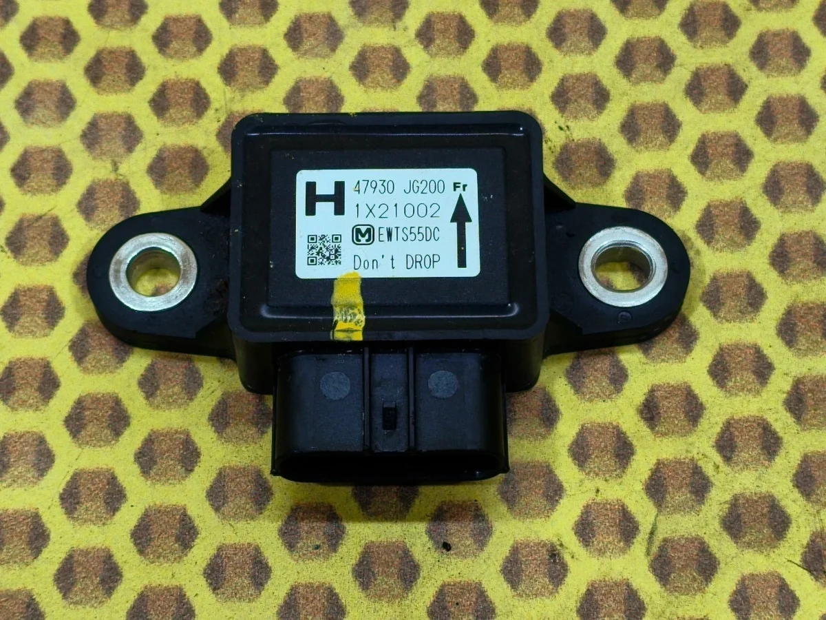 Датчик ускорения Nissan X-Trail 2012 47930JG200 T31 M9R