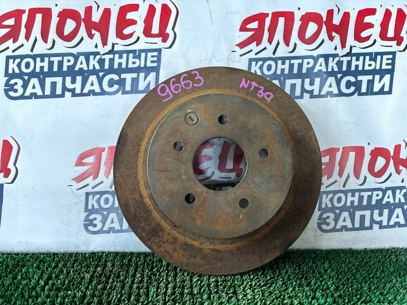 Тормозной диск Nissan X-Trail 432068H701 NT30 QR20DE, задний
