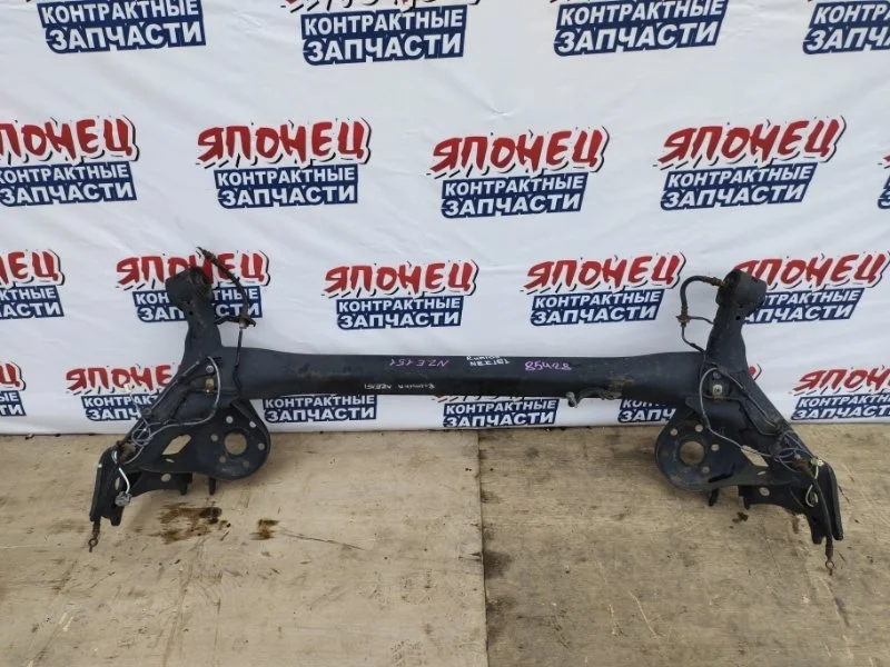 Балка Toyota Corolla Rumion 4210112171 NZE151 1NZ-FE, задняя