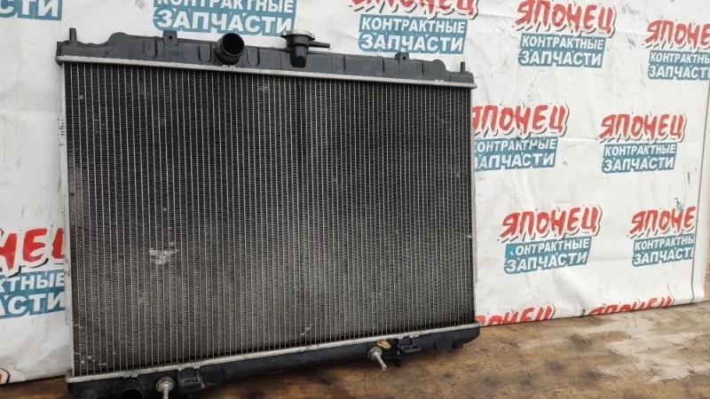 Радиатор основной Nissan X-Trail 214608H303 NT30 QR20DE