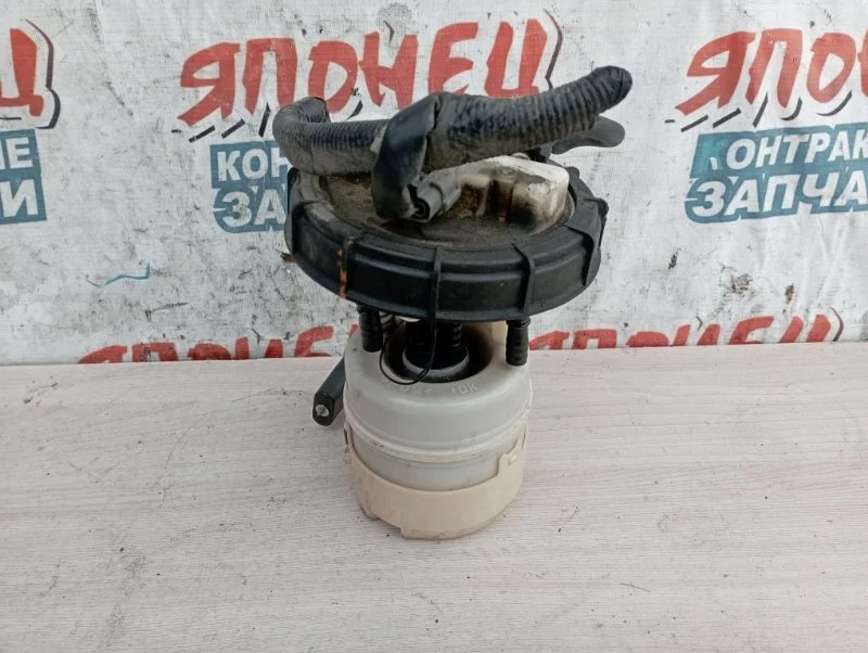 Топливный насос Nissan March 17040AX000 AK12 CR12DE