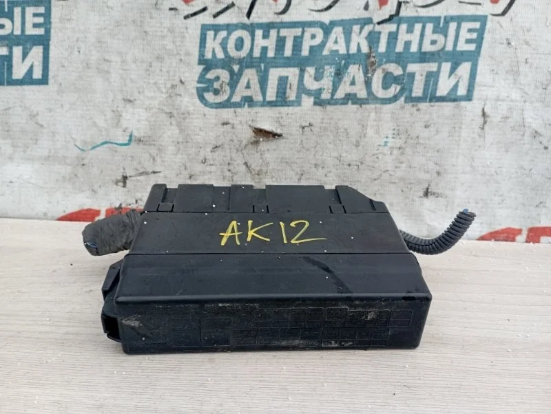Блок предохранителей под капот Nissan March 24382AX001 AK12 CR12DE