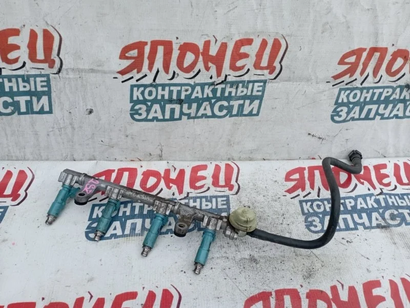 Форсунка Toyota Ractis 2325023020 SCP100 2SZ-FE