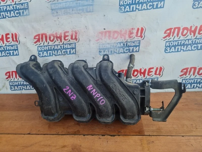 Коллектор впускной Toyota Porte 1712021010 NNP10 2NZ-FE